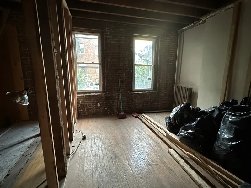 Union City, NJ gut renovation: taken down to the brick walls and joists