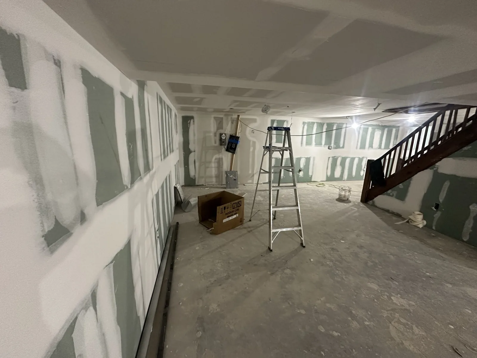 Basement walls boarded and taped before finishing in Hackensack, NJ